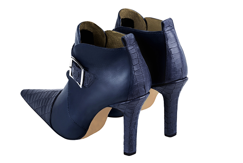 Denim blue women's ankle boots with buckles at the front. Pointed toe. Very high slim heel. Rear view - Florence KOOIJMAN